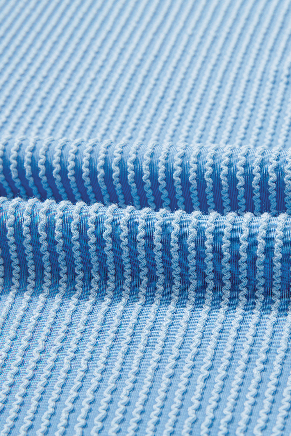 Myosotis Twisted Rib Uneven Hem Drop Shoulder Loose Knit Top