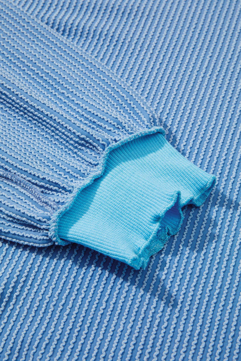 Myosotis Twisted Rib Uneven Hem Drop Shoulder Loose Knit Top